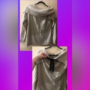 Crème tan sweater off the shoulders